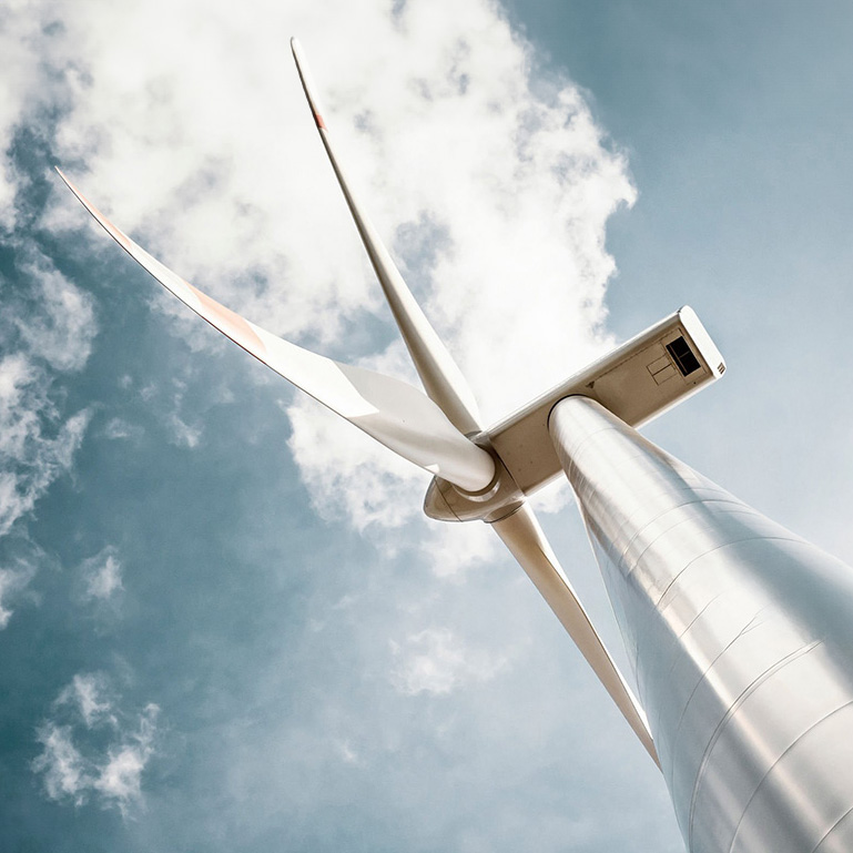 Wind turbine in retro colors with added grain